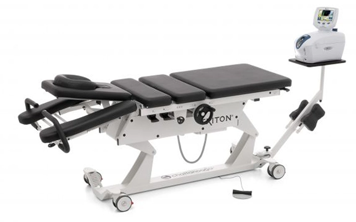 A black spinal decompression table.